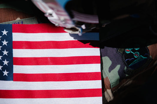 a close up of an american flag on a jacket