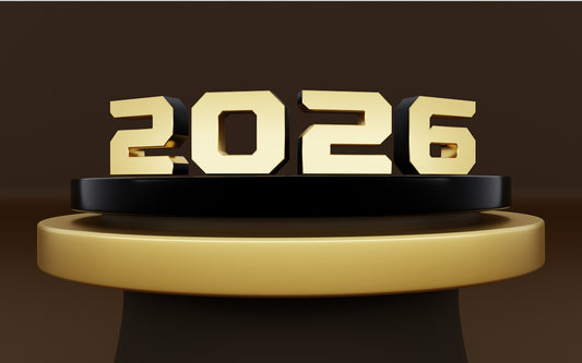 The year 2026 displayed in gold on a podium.